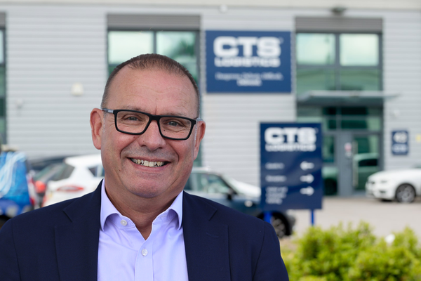 CTS Logistics Commercial Director Richard Myers in front of CTS Logistics Headquarters on bright day